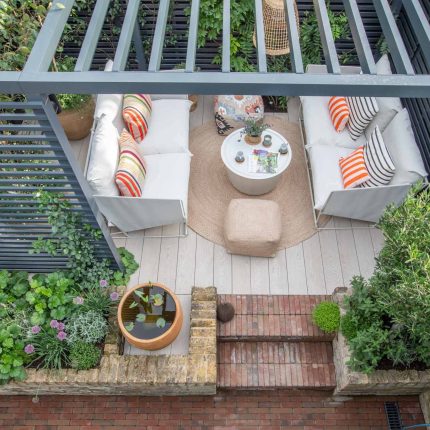 Greenwich Charlton Garden Design by The Garden Builders, outdoor lighting, Pergola structure, roof terrace building company in London top rated, Garden Room.