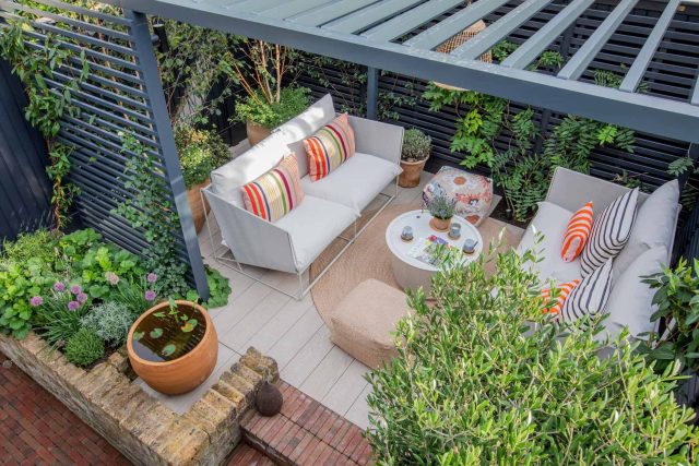 Greenwich Charlton Garden Design by The Garden Builders, outdoor lighting, Pergola structure, roof terrace building company in London top rated, Garden Room.