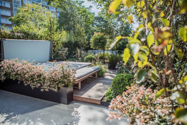 Garden Designer Guildford Surrey Garden Design Landscape Contractor builders, raised decked pathway leads from the gleaming terrace to the hot tub area where an.