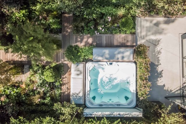 Garden Designer Guildford Surrey Garden Design Landscape Contractor builders, raised decked pathway leads from the gleaming terrace to the hot tub area where an.