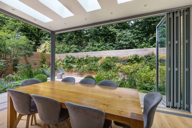 Hardscaping design structure and contrast elements to the organic forms, and likewise provides continuity between the indoor and outdoor areas of the property.