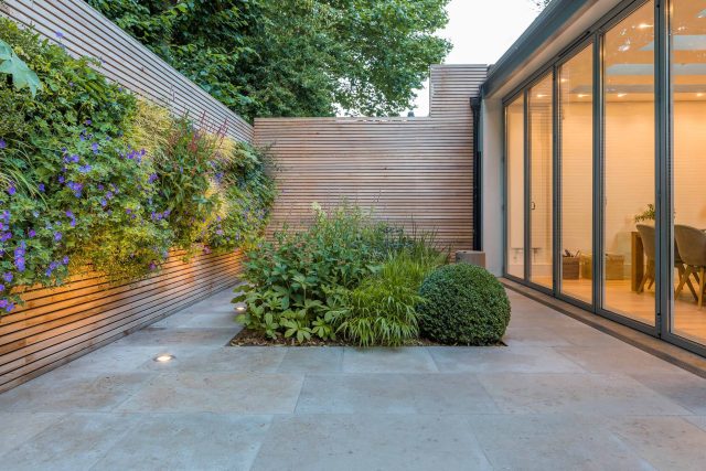 Hardscaping design structure and contrast elements to the organic forms, and likewise provides continuity between the indoor and outdoor areas of the property.