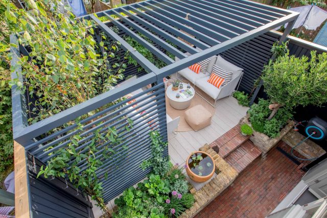 Greenwich Charlton Garden Design by The Garden Builders, outdoor lighting, Pergola structure, roof terrace building company in London top rated, Garden Room.