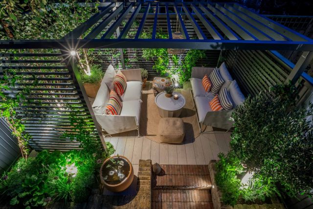 Greenwich Charlton Garden Design by The Garden Builders, outdoor lighting, Pergola structure, roof terrace building company in London top rated, Garden Room.