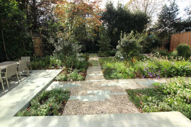 Garden Design Golders Green Strict, linear geometry gives way to a gently curving, hoggin path around the house vibrant relaxing space designed by Lynne Marcus.