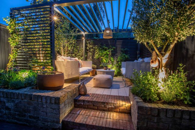 Greenwich Charlton Garden Design by The Garden Builders, outdoor lighting, Pergola structure, roof terrace building company in London top rated, Garden Room.