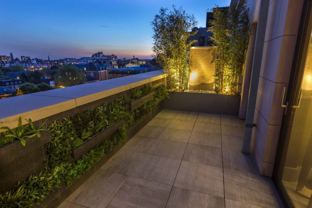 Roof Terrace Design St John's Wood London, by The Garden Buidlers artificial grass, artificial decking and cladding, roof garden to created sunset silhouettes.