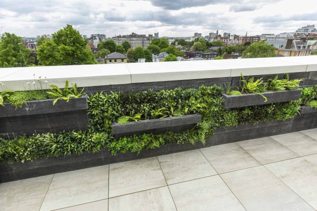 Roof Terrace Design St John's Wood London, by The Garden Buidlers artificial grass, artificial decking and cladding, roof garden to created sunset silhouettes.