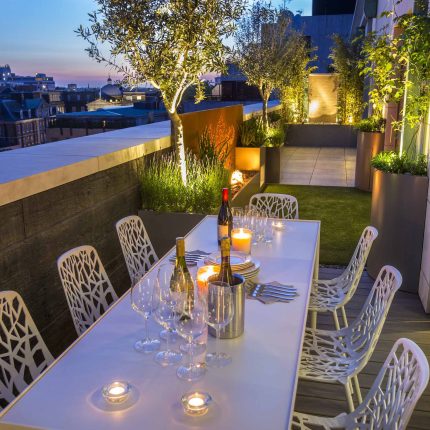 Roof Terrace Design St John's Wood London, by The Garden Buidlers artificial grass, artificial decking and cladding, roof garden to created sunset silhouettes.
