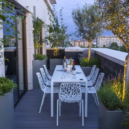 Roof Terrace Design St John's Wood London, by The Garden Buidlers artificial grass, artificial decking and cladding, roof garden to created sunset silhouettes.