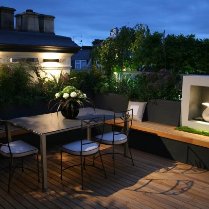 Kensington Roof Garden Terrace roof top designer by Andy Sturgeon combines timber and mixed planting to the highest level creating a beautiful roof top space.