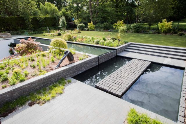 Contemporary garden Kingston Surrey, designed to exuding modern glamour with entertaining and activity space, geometric striking lines, architectural space.