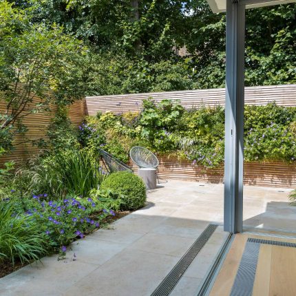Hardscaping design structure and contrast elements to the organic forms, and likewise provides continuity between the indoor and outdoor areas of the property.