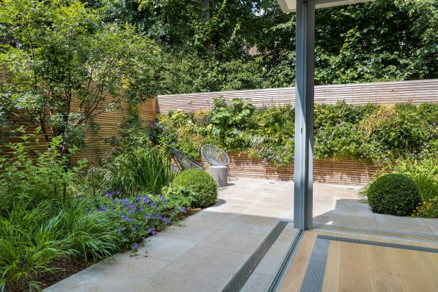 Hardscaping design structure and contrast elements to the organic forms, and likewise provides continuity between the indoor and outdoor areas of the property.