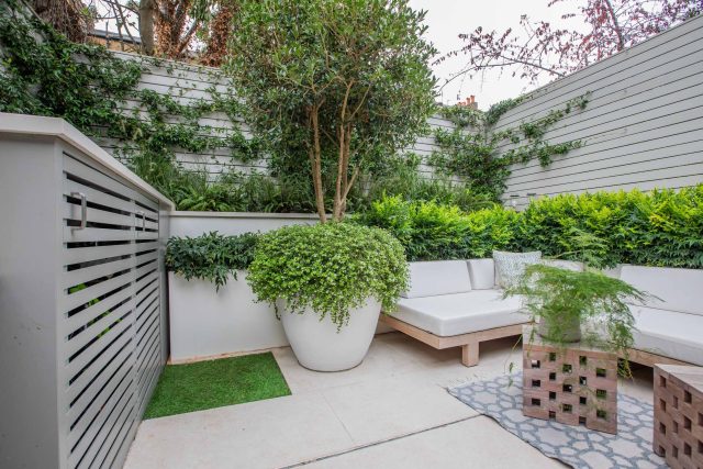 A brilliant design & build for this Small Garden in the heart of Clapham which encompasses a contemporary feel wash of vibrant colours landscaping company.
