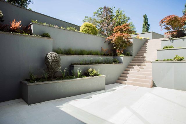 Contemporary garden Kingston Surrey, designed to exuding modern glamour with entertaining and activity space, geometric striking lines, architectural space.