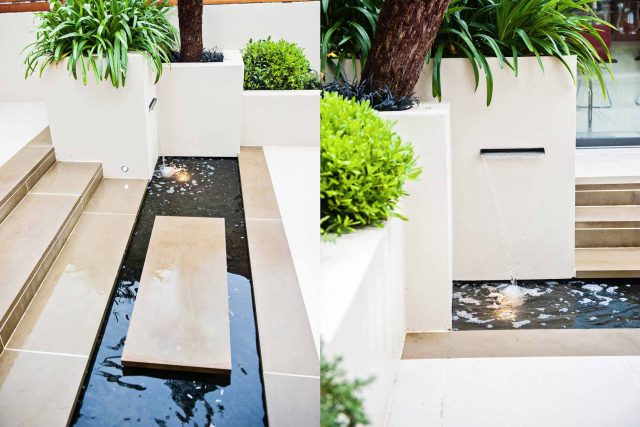 Beautiful London Garden, Clancarty Road, London, new block rendered boundary walls, planting, lighting, submersible water lights, bright contemporary effect.