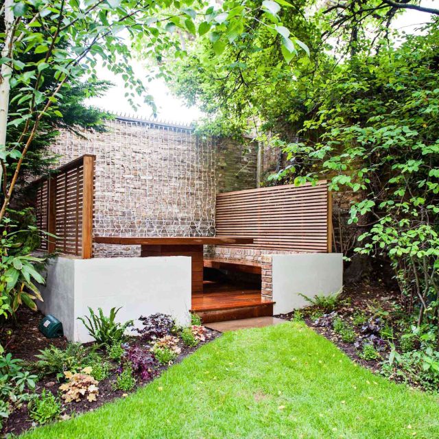 Banquette Dining Area Maida Vale, outdoor dining entertaining area with free standing table was commissioned, for family al fresco dining and for entertaining.