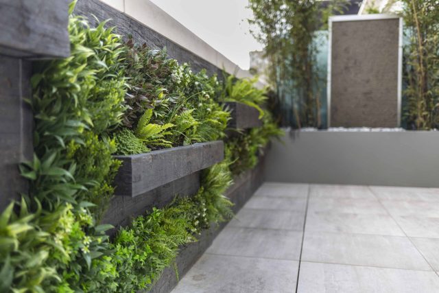 Roof Terrace Design St John's Wood London, by The Garden Buidlers artificial grass, artificial decking and cladding, roof garden to created sunset silhouettes.