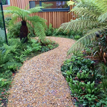 Garden Design Golders Green Strict, linear geometry gives way to a gently curving, hoggin path around the house vibrant relaxing space designed by Lynne Marcus.