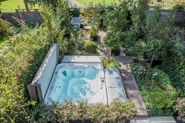 Garden Designer Guildford Surrey Garden Design Landscape Contractor builders, raised decked pathway leads from the gleaming terrace to the hot tub area where an.