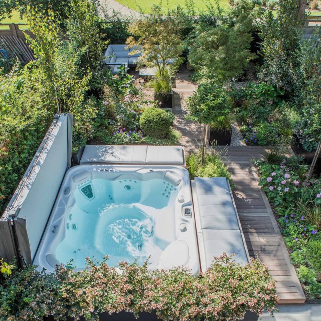 Garden Designer Guildford Surrey Garden Design Landscape Contractor builders, raised decked pathway leads from the gleaming terrace to the hot tub area where an.