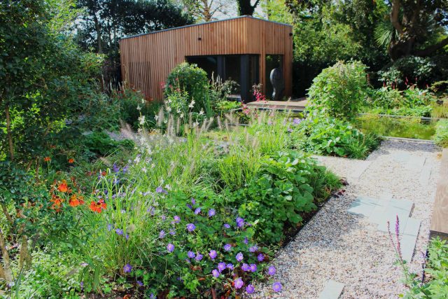Garden Design Golders Green Strict, linear geometry gives way to a gently curving, hoggin path around the house vibrant relaxing space designed by Lynne Marcus.