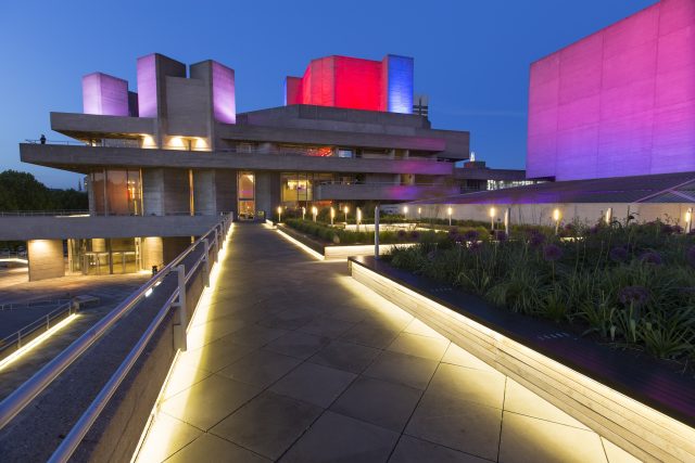 An allium planter with LED lighting along a walkway on the brutalist South Bank.