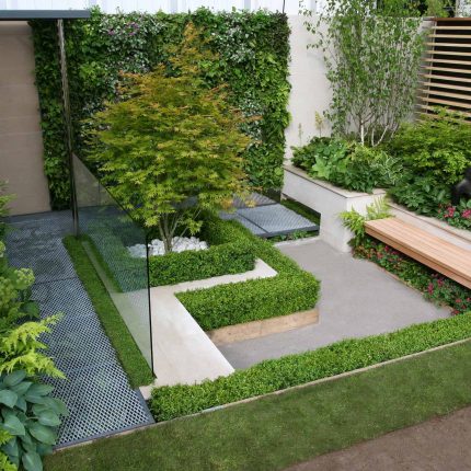 Award Winning Eco Chic Garden RHS Gold Medal 09 designed by Kate Gould constructed by The Garden Builders Chelsea Flower Show 2009 pergola hedging shrubs.