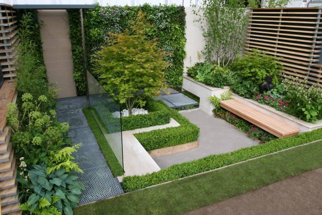 Award Winning Eco Chic Garden RHS Gold Medal 09 designed by Kate Gould constructed by The Garden Builders Chelsea Flower Show 2009 pergola hedging shrubs.