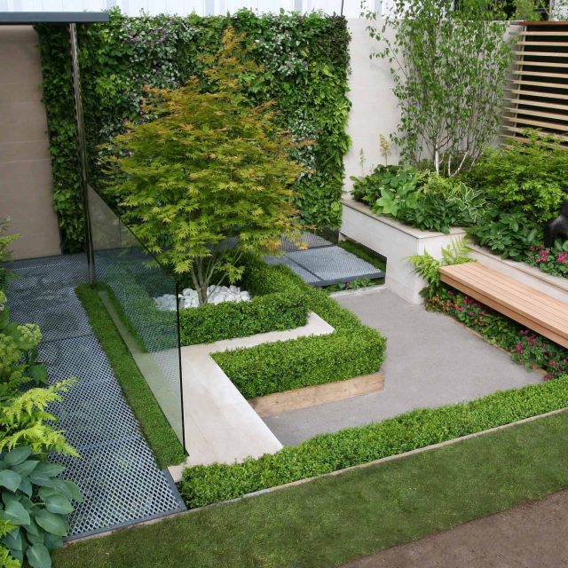 Award Winning Eco Chic Garden RHS Gold Medal 09 designed by Kate Gould constructed by The Garden Builders Chelsea Flower Show 2009 pergola hedging shrubs.
