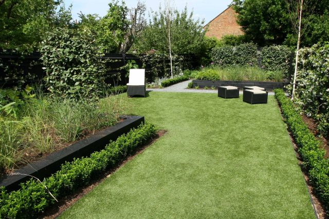 Family garden Barnes receives Highly Commended at Garden Design award with Declan Buckley in London, multi-functional outdoor environment cooking, dining, play.