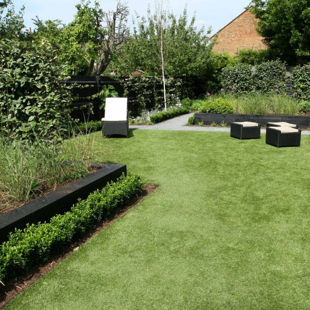 Family garden Barnes receives Highly Commended at Garden Design award with Declan Buckley in London, multi-functional outdoor environment cooking, dining, play.