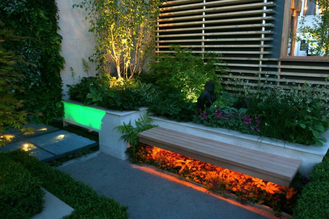 Award Winning Eco Chic Garden RHS Gold Medal 09 designed by Kate Gould constructed by The Garden Builders Chelsea Flower Show 2009 pergola hedging shrubs.