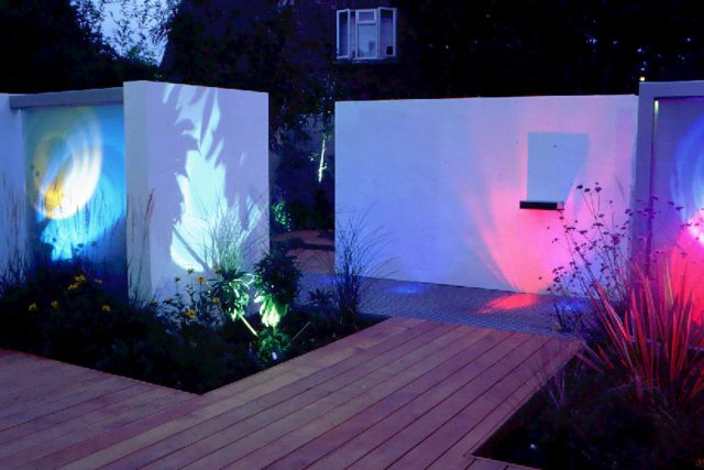 Pool Contemporary Design Landscaping Large rendered walls, metal screening, and cedar decking by Paul Dracott in Barnes West London, consisting sleek design.