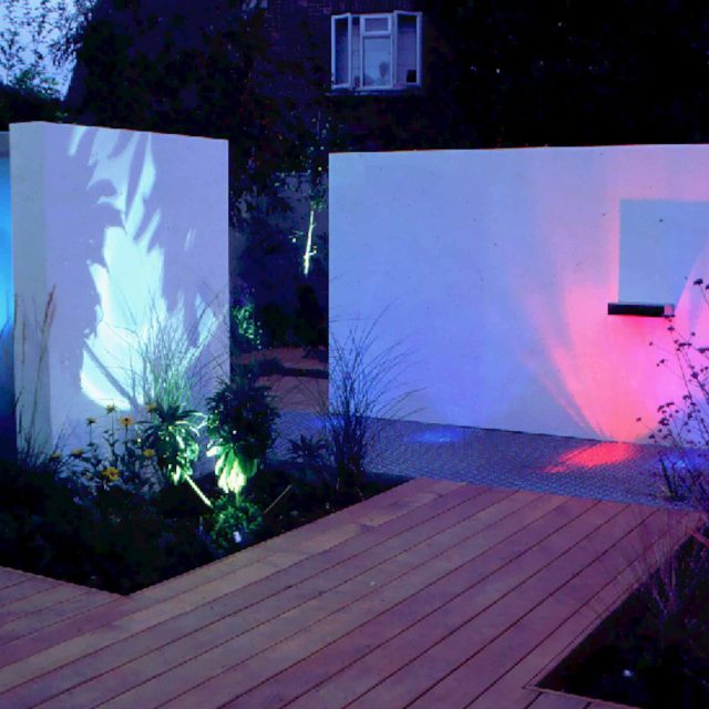 Pool Contemporary Design Landscaping Large rendered walls, metal screening, and cedar decking by Paul Dracott in Barnes West London, consisting sleek design.