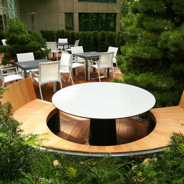 Commercial building contractors outdoor relaxation, seating dining area with Pringle Brandon Architects in Weybridge Surrey, hospitality roof garden company.