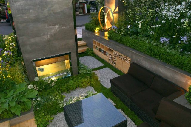 Award Winning RHS Silver Gilt Medal by Kate Gould, The Garden Builders RHS Chelsea Flower Show 2010, outdoor room, bio-gel fireplace, concrete chimney.