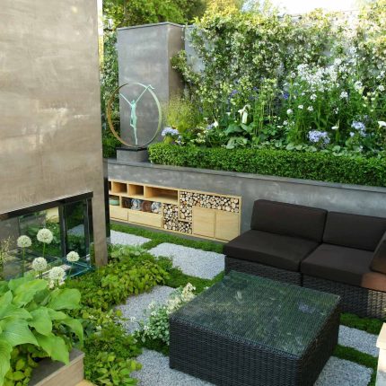 Award Winning RHS Silver Gilt Medal by Kate Gould, The Garden Builders RHS Chelsea Flower Show 2010, outdoor room, bio-gel fireplace, concrete chimney.