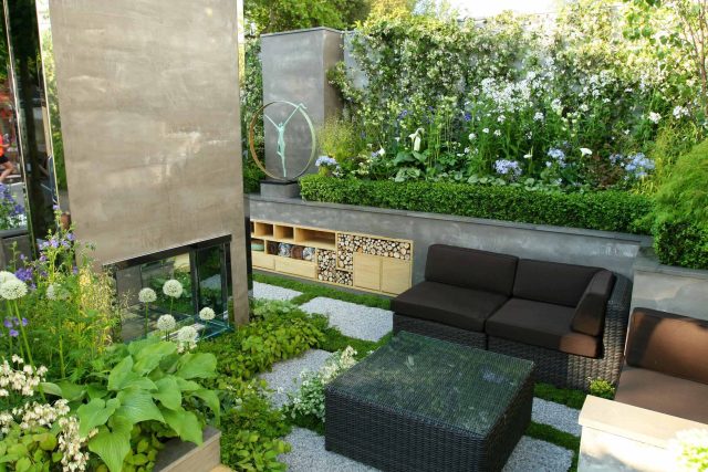 Award Winning RHS Silver Gilt Medal by Kate Gould, The Garden Builders RHS Chelsea Flower Show 2010, outdoor room, bio-gel fireplace, concrete chimney.