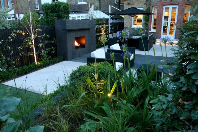 Family garden Barnes receives Highly Commended at Garden Design award with Declan Buckley in London, multi-functional outdoor environment cooking, dining, play.