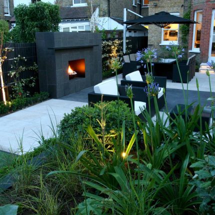 Family garden Barnes receives Highly Commended at Garden Design award with Declan Buckley in London, multi-functional outdoor environment cooking, dining, play.