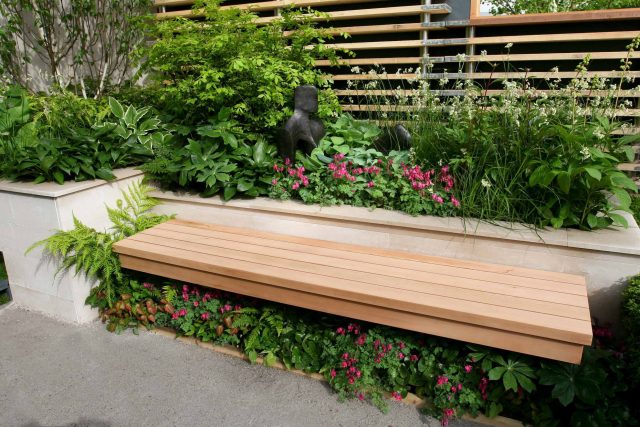 Award Winning Eco Chic Garden RHS Gold Medal 09 designed by Kate Gould constructed by The Garden Builders Chelsea Flower Show 2009 pergola hedging shrubs.
