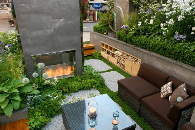 Award Winning RHS Silver Gilt Medal by Kate Gould, The Garden Builders RHS Chelsea Flower Show 2010, outdoor room, bio-gel fireplace, concrete chimney.