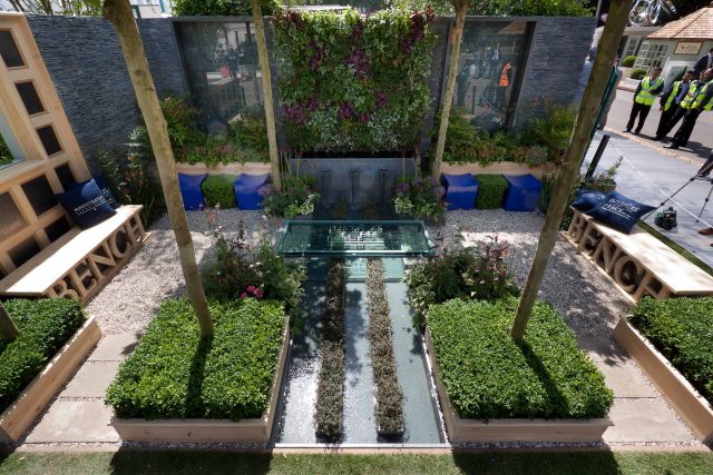 Large city garden design space for a grand house by Kate Gould, Magistrates Garden RHS 2011 Silver Gilt outdoor relaxing space, curved bench, water feature.