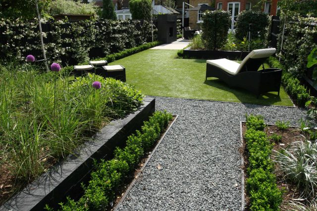 Family garden Barnes receives Highly Commended at Garden Design award with Declan Buckley in London, multi-functional outdoor environment cooking, dining, play.