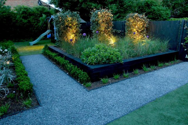 Family garden Barnes receives Highly Commended at Garden Design award with Declan Buckley in London, multi-functional outdoor environment cooking, dining, play.