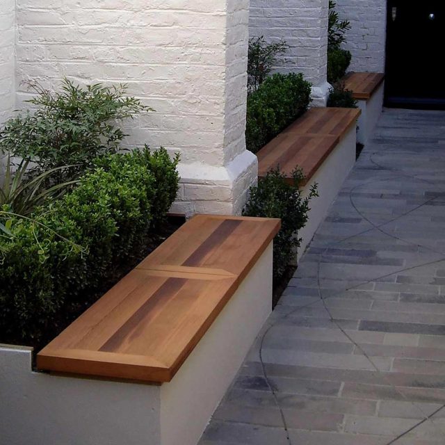 Private School Garden Notting Hill Hardwood seating contemporary style by Andy Sturgeon, commercial school playground unique design and landscaping groundwork.