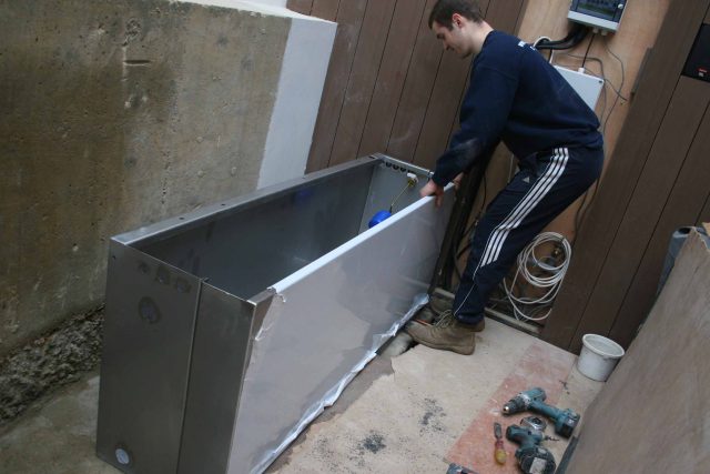 Outdoor hot tub and waterwall Garden Designs Plan Build in Central London Water feature constructed on-site along with the rear steel framework Highly Commended.
