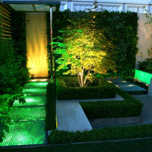 Award Winning Eco Chic Garden RHS Gold Medal 09 designed by Kate Gould constructed by The Garden Builders Chelsea Flower Show 2009 pergola hedging shrubs.